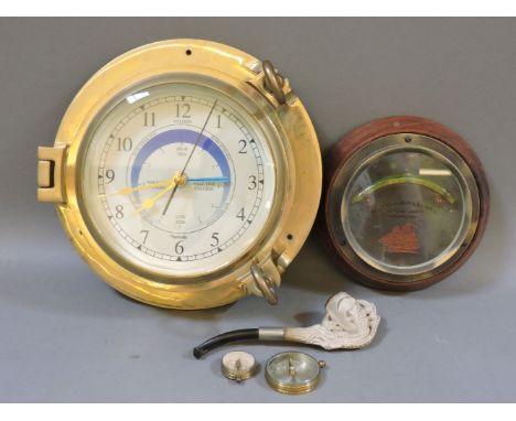 A Nautical tide clock, in brass case, together with a Kelvin Bottomley & Bard Ltd ship level clinometer, two compacts, and a 