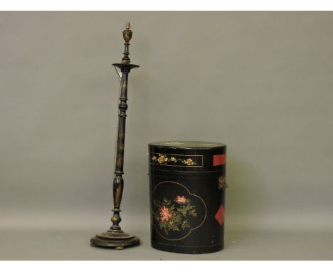 A tea chest, painted with birds and flowers against black, and a similar standard lamp