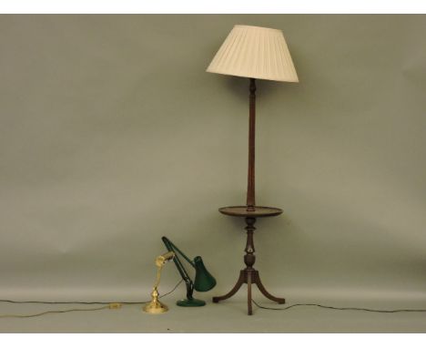A mahogany standard lamp, an angle poise lamp, and a brass desk lamp