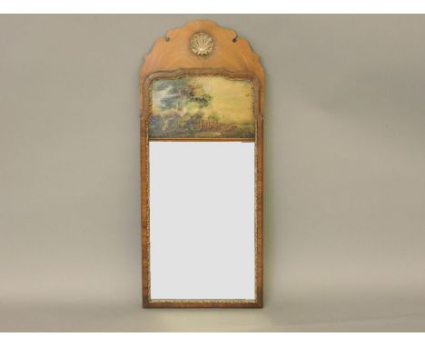 A George I style painted pier glass mirror, walnut frame with gilt banding and painted country scene