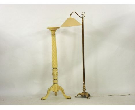 An Art Nouveau brass floor standing reading lamp, 168cm, and a cream painted torchère
