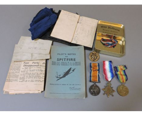 A WWI trio, awarded to 16619 Pte W Wilkinson Y and LR, an RAF cap badge, a mark VIII pilot's notes booklet for a Spitfire, le