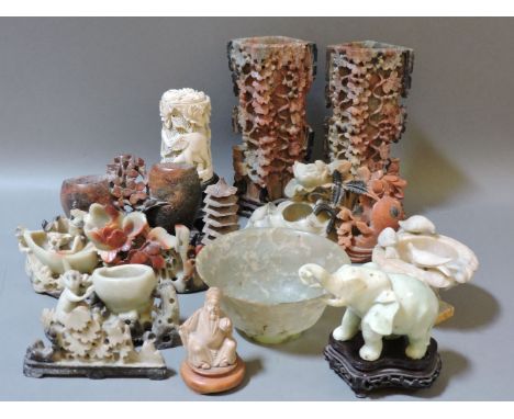 A collection of eleven pieces of soapstone, a jade elephant, and an early 20th century African ivory lamp