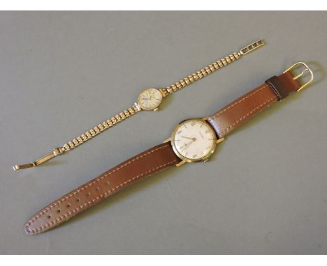 A 9ct gold ladies Rotary quartz bracelet wristwatch, with bow link bracelet, and a 9ct gold gentleman's Rotary mechanical wri