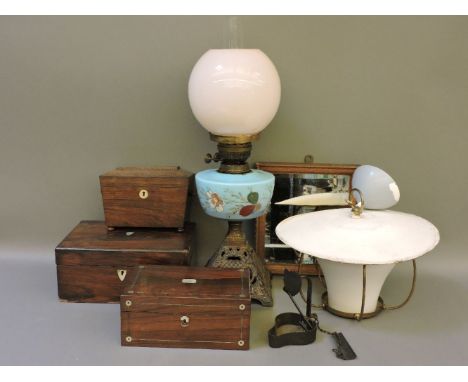 A Victorian oil lamp, with a blue glass reservoir, a hanging pendant lamp, a rosewood tea caddy, and two boxes