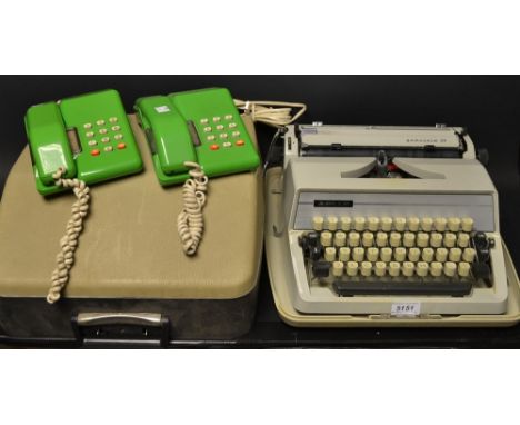 A Viscount 1980's Push Button BT Retro Telephone in lime green; another; an Adler typewriter