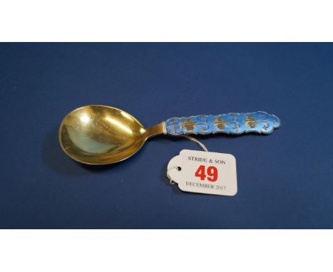 A Norwegian silver gilt and enamel spoon, by J Tostrup, Norway, 15cm. Condition Report: some damage to blue enamel decoration