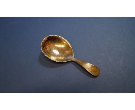 A George III silver caddy spoon, by Thomas Dicks, London 1815, 8cm. Condition Report: good.  Marks clear.