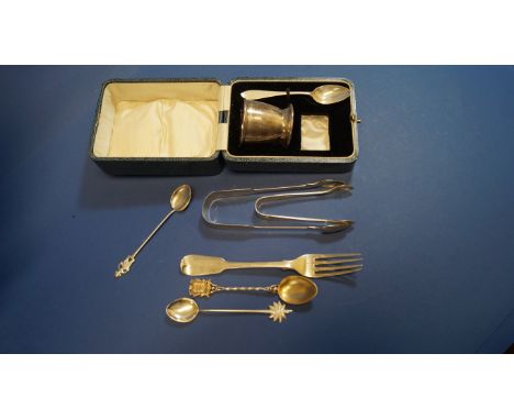 A small quantity of silver cutlery; together with a cased egg cup and spoon, (lacking napkin ring), 116g.