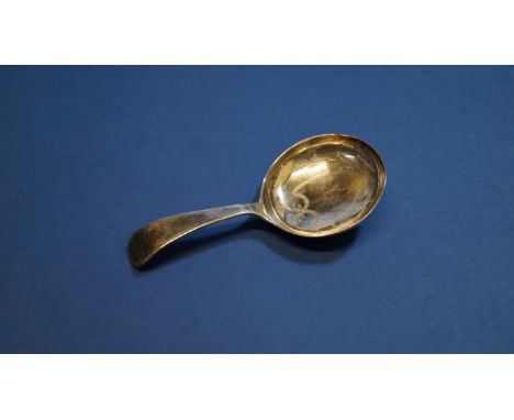 A George III silver tea caddy spoon, by I T, Birmingham  1799, having circular bowl and brightcut decoration, 7.7cm. Conditio