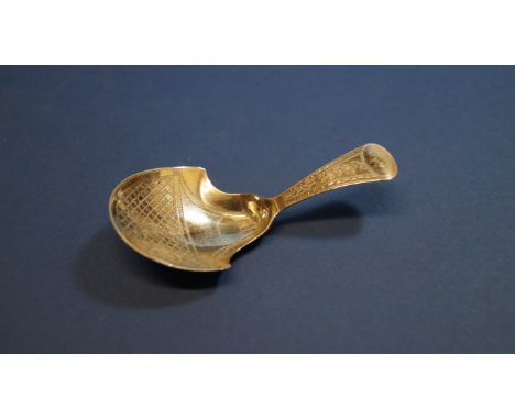 A George III silver caddy spoon, by I T, Birmingham 1810, having chased decoration, 8cm. Condition Report: good. Marks clear.