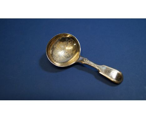 A Victorian silver fiddle pattern caddy spoon having chased decoration, by James Wintle , London 1838, 5.5cm.