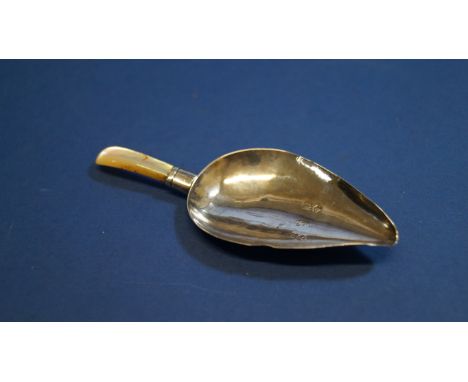 A silver caddy spoon, having mother of pearl handle, by W K, London 1828, 9.3cm. Condition Report: some denting to rim, marks