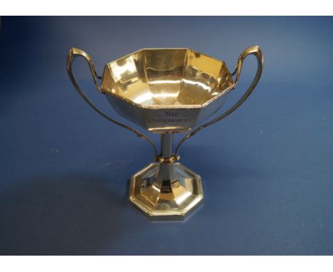 A silver twin handled trophy cup, by Harrison Brothers & Howson, Sheffield 1929, 270g, 15cm.