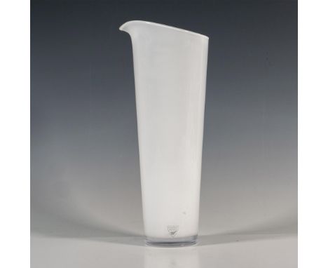 A slender, handleless milky-white pitcher. Orrefors stickered. Dimensions: 4"L x 3.5"W x 10.25"HManufacturer: OrreforsCountry