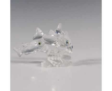 Three clear crystal fish swimming over a frosted coral. Swarovski marked. This item has its original box: 5"W x 3.75"H. Artis