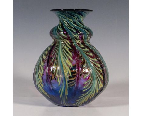 A polychrome blown glass vase designed by Charles Lotton (American, 1935-2021). Purple-pink glass with green cane glass in a 