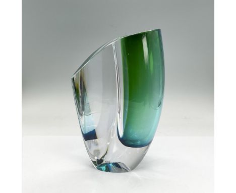 Fabulous vase in clear blue and green glass. It is a sculpture, a vase, and an art piece all in one. Kosta Boda etched mark a