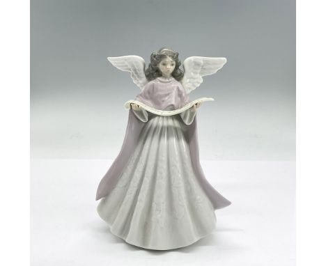 Glazed porcelain figure of a young lady angel in a white dress and pink cape holding a scroll. Lladro backstamp. This item ha