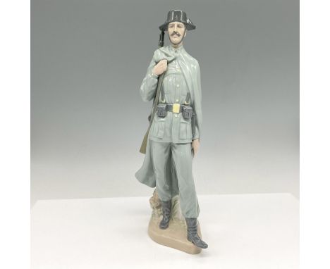 Glossy figural in full uniform. Colored in sage green and gray. Lladro backstamp. Artist: Salvador FurioIssued: 1974 - 2002Di