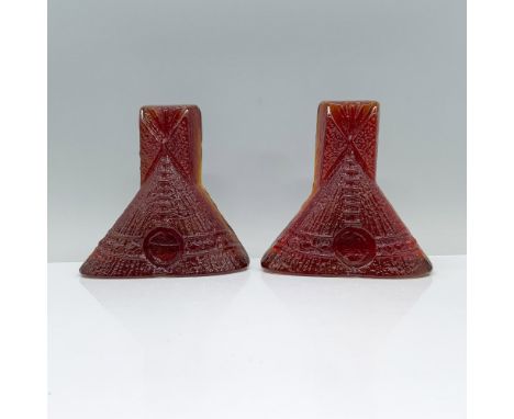 Amber-colored and meticulously crafted in the shape of teepees, featuring fine detailed cuts. Dimensions of the largest item: