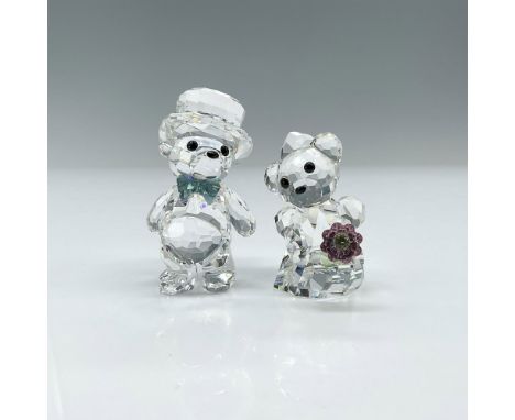 Part of the Lovlots Kris Bears Collection, the Bride and Groom figurines are crafted from clear crystal, with eyes and nose m