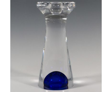 A clear abstract form candlestick holder accented with a sapphire-blue glass bubble at the bottom. Kosta Boda and artist's na