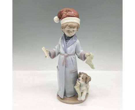 Glossy figural with Santa hat on ready to hang his stockings and wish list. Lladro backstamp. This item has its original box: