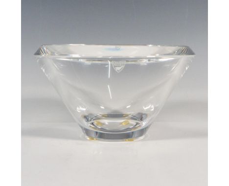 A clear round smooth decorative bowl with a slanted rim. Orrefors stickered. Artist: Lena BergstromIssued: 21st centuryDimens