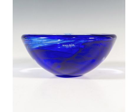 A clear centerpiece bowl with navy blue swirls. Kosta Boda sticker. Artist: Anna EhrnerDimensions: 7"W x 3"HManufacturer: Kos