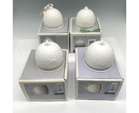 Matte finished bells with raised designs each representing a season. Lladro backstamp. This item has its original box: 5"L x 