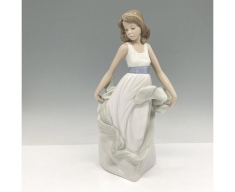 Glossy figural in long white dress holding sage wrap. Nao by Lladro backstamp. 02001343. Artist: Rafael LozanoIssued: 2000Dim