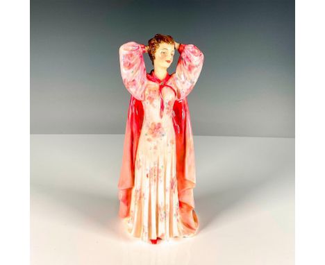 Rare one-of-a-kind unrecorded figurine of an Art Deco style woman in a lovely floral gown with a pink to reddish cape. Royal 