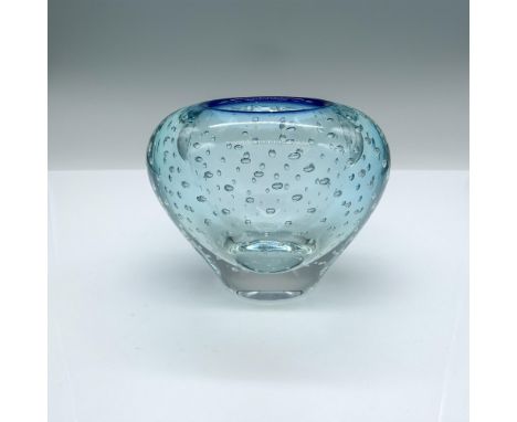 This bubbly blue green art glass candle holder is marked Evolution by Waterford on the bottom. Dimensions: 5.25"L x 4.5"W x 4