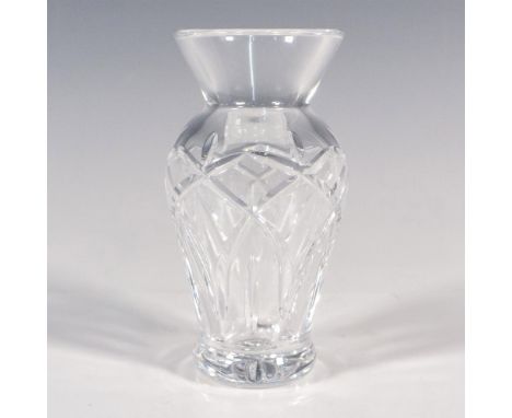 A small clear crystal vase with vertical and curve cuts. Marquis by Waterford Crystal stickered and etched marking. This item