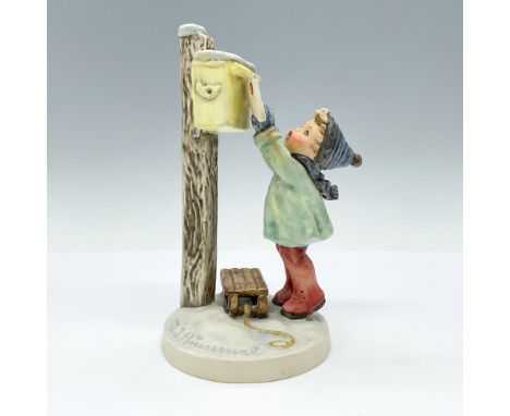 Hand-painted porcelain figurine depicting young boy excitedly posting his letter to Santa. Goebel TMK5. Issued: 1972-1979Dime