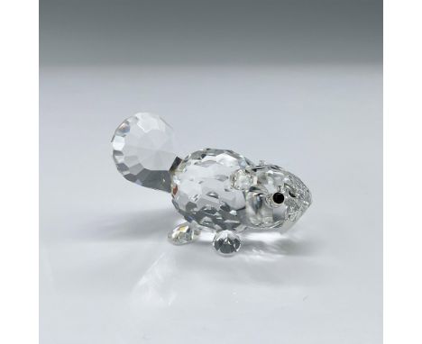 Clear crystal beaver figurine depicted with its tail up, featuring black eyes and frosted teeth, ideal for adding a touch of 