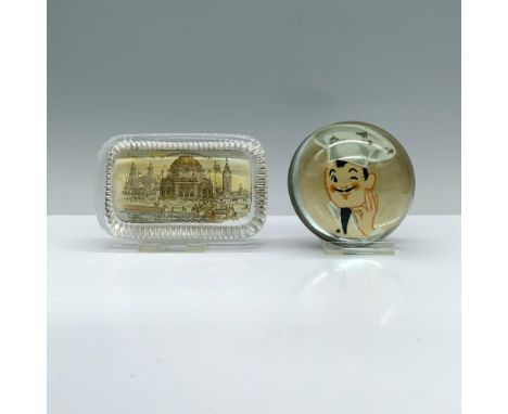 One paperweight is square, with artwork of Buffalo, New York's Pan American Exposition at the Temple of Music, while the othe