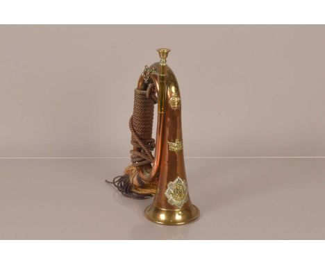 A WWI Royal Scots Bugle by RS, owned by Piper/Bugler R Drummond (8450), 1st Battalion, Royal Scots (Lothian Regiment), having