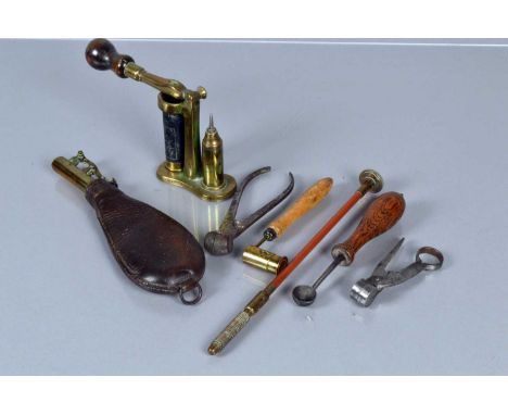A collection of vintage shot making equipment, to include a shotgun cartridge maker by Ward &amp; Sons (12), a powder measure