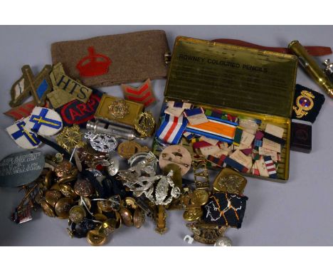 An assortment of various items, to include a selection of British medal ribbons, an Army Council Armband, selection of cloth 