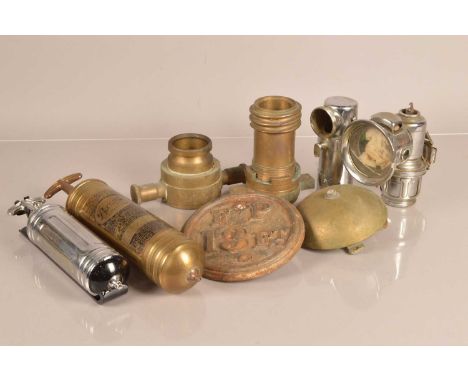 An assortment of Fire Fighting items, including a Pyrene Extinguisher, connectors, plaques, a bell, plus a Lucas Lamp (parcel