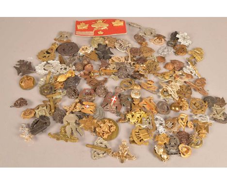 An extensive collection of British and Overseas Military Cap badges, comprising the Windsor Regiment, The Kings Royal Rifle C