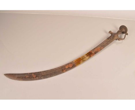 A Middle Eastern Talwar, having approximately 70cm curved double filler blade, with two circular instamped lines and dots to 