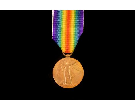 A WWI Royal Army Chaplians Department Victory medal, awarded to Reverend Charles Noel Bernard Beamish, medal stamped 'REV.C.N