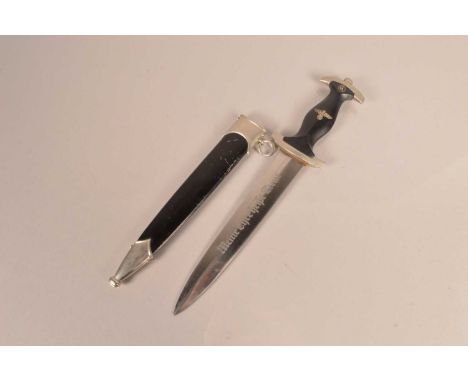 A Reproduction German SS Dagger, marked RZM M7/36 to the blade, with motto to the opposite side, complete with scabbard