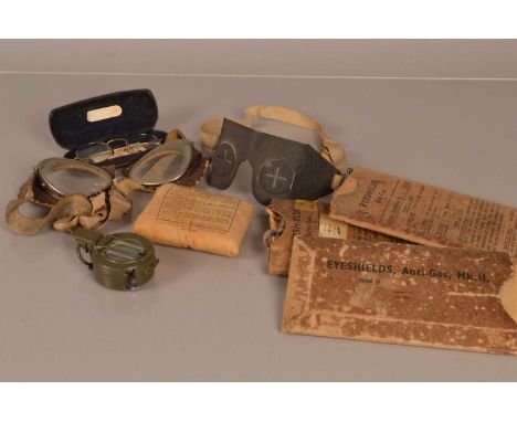 A pair of WWII Civil Defence Anti Flak/Splinter Goggles, together with another pair of goggles, anti-gas eye shields, a pocke