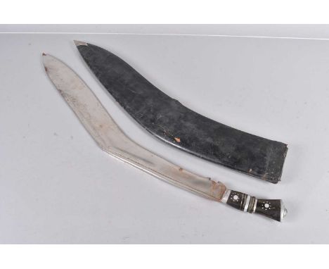 A very large Indian Kukri knife, having 64cm long chromed blade, with hand etched designs, with lion head terminal, complete 