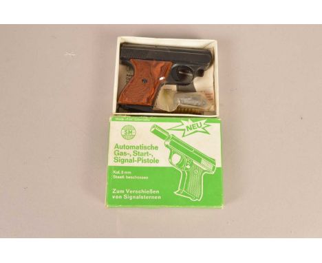 A German SM 8mm Starting Pistol, Model 15, complete with cleaning rod and retailers box, 18+ Identification and Disclaimer Si