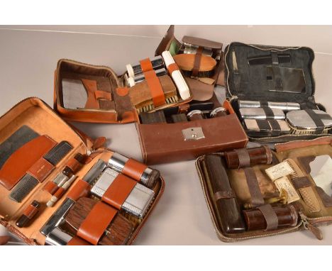 A collection of Men's Shaving sets, including a WWII set by Briton Brush Coy Ltd, marked Army 1944, Perma-Sharp, Two-Tix and 